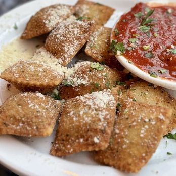 Mama’s on The Hill signature dishes Toasted RavioliMama's Sugo with SpaghettiChicken Parmigiano